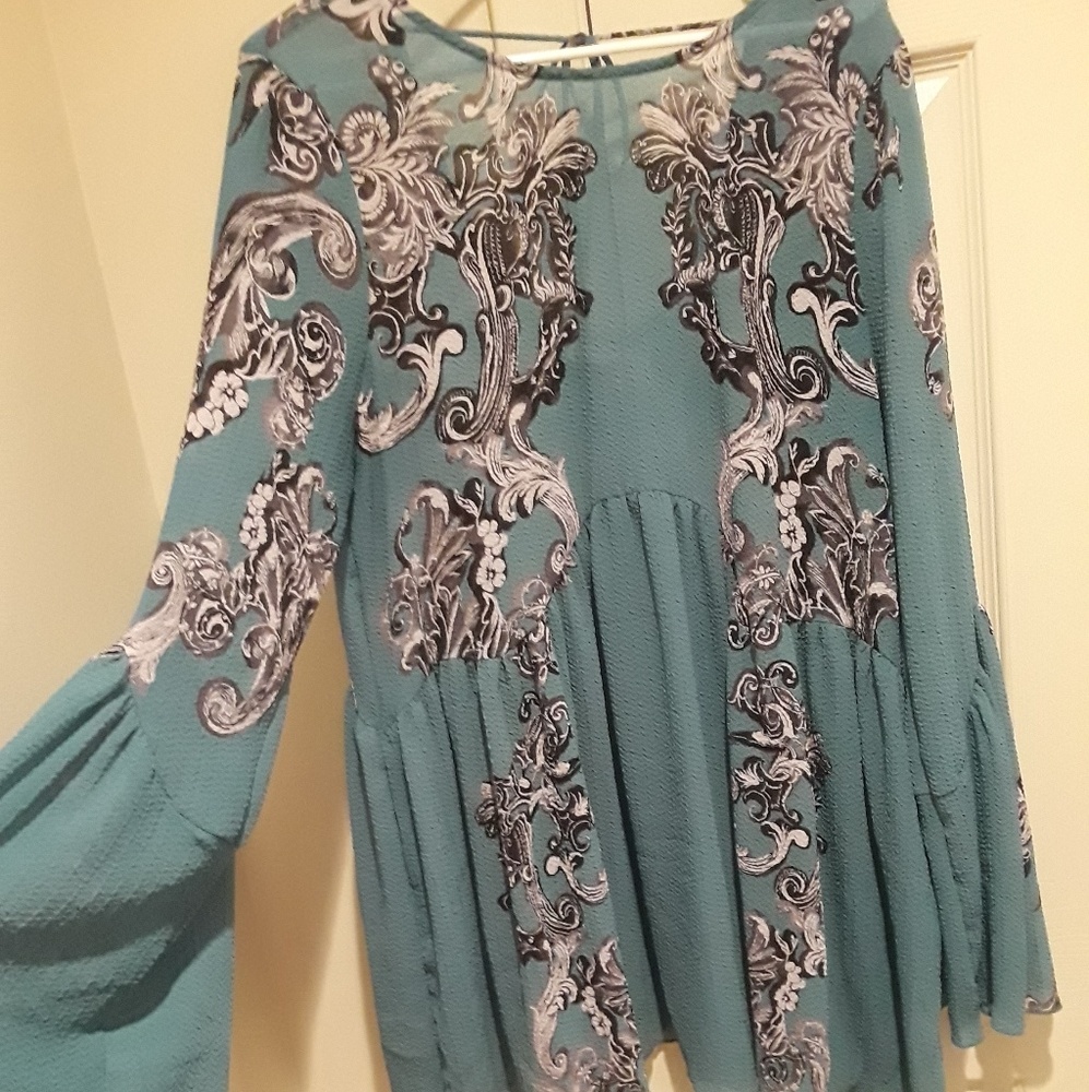 Bell sleeved top